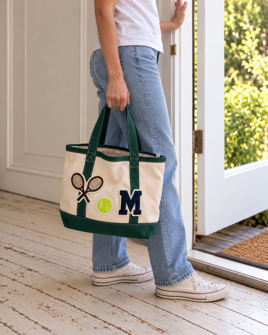 Woman carrying a custom patch tote bag, a custom merch idea